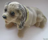 Игрушка собака качающяя головой